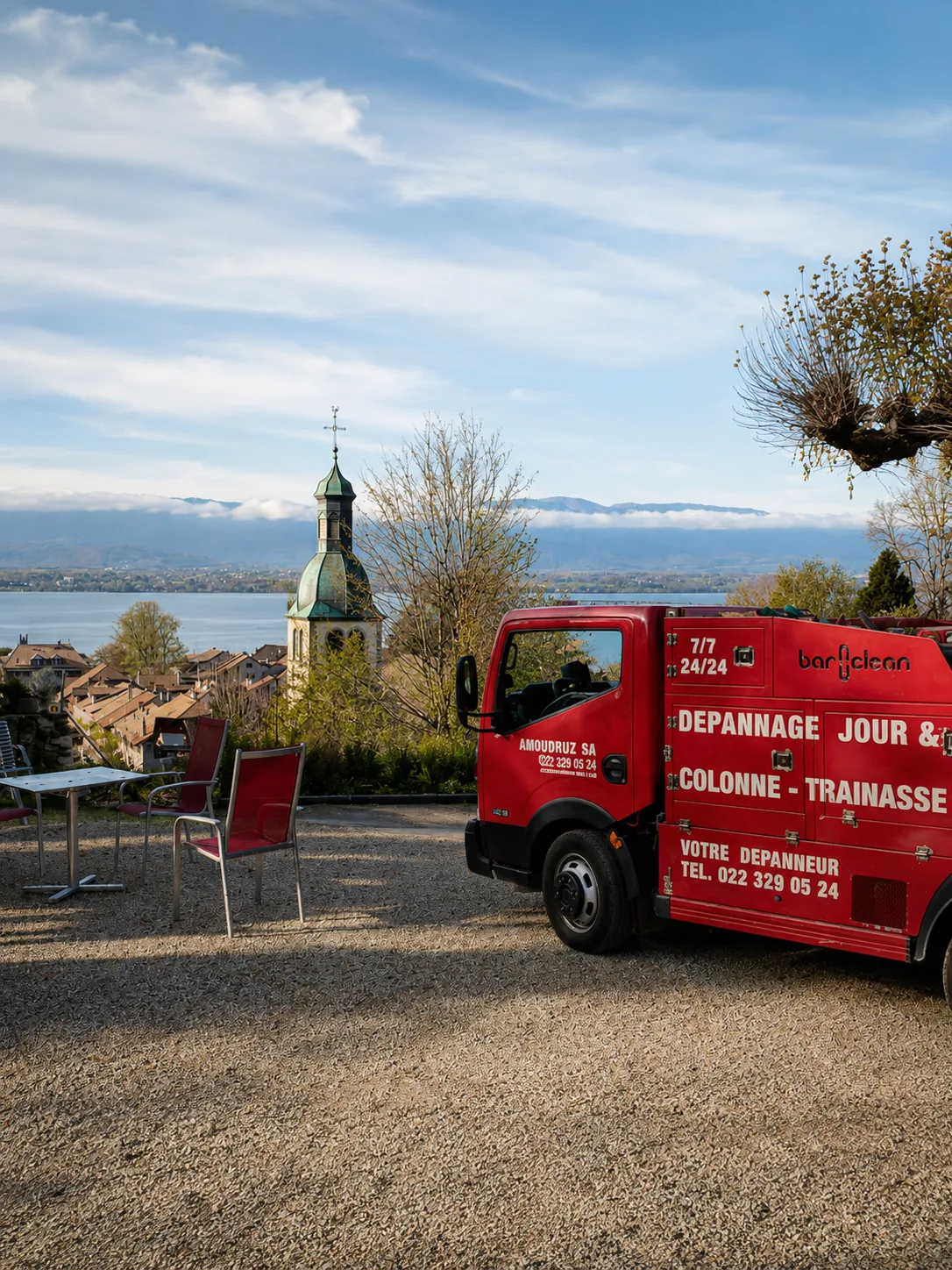 Camion Amoudruz SA devant le lac Léman, savoir-faire genevois depuis 1848
